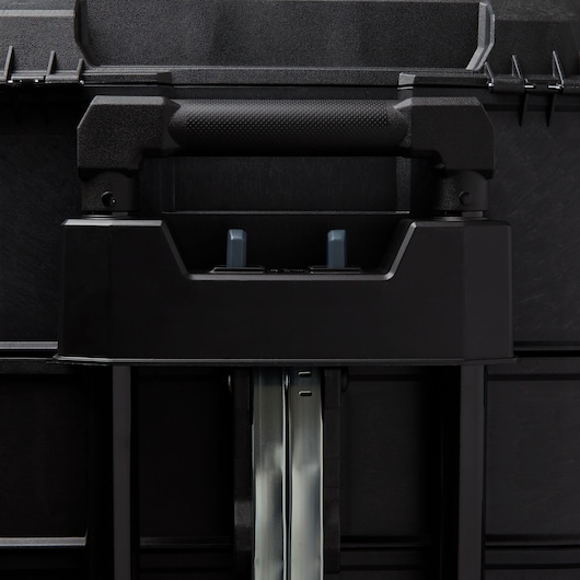 STANLEY 020800R black tool box handle and telescopic metal rails, close-up photography.