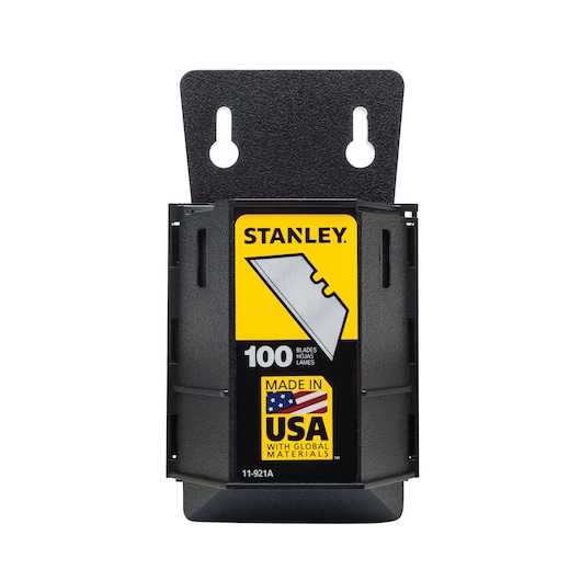 Front angle on white of STANLEY 100-pack utility knife blades in black dispenser with yellow label and USA flag graphic.