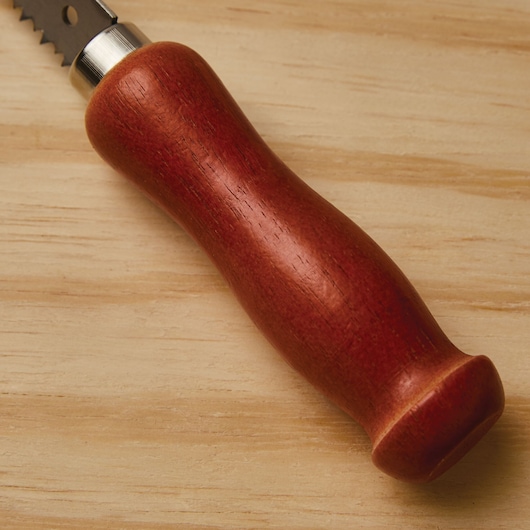STANLEY 15-206 wood handle saw photographed on light wood surface.