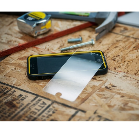 STANLEY 2151547ST2 phone screen protector on smartphone, photography on workbench with hardware and tools.
