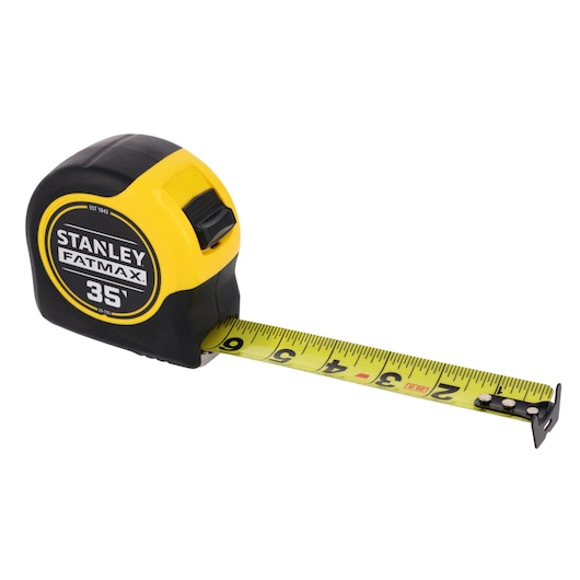 STANLEY 33-735THR tape measure, yellow and black, angled on white background, extended blade visible