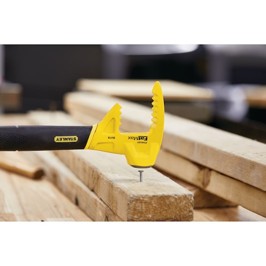 STANLEY 55-119 demolition tool in use on wooden planks, close-up side angle.