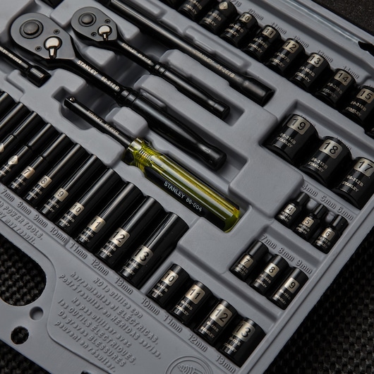 Photo of STANLEY 92-839 socket and ratchet set with labeled black sockets and screwdriver in gray tray.