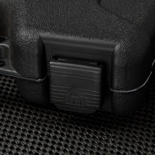 STANLEY 92-839 black textured hard case latch close-up on black mesh surface.