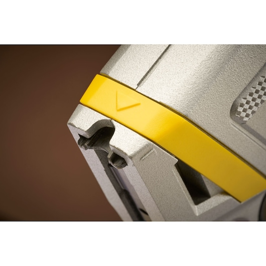 Close-up photo of STANLEY FMHT70100 hand tool with yellow accent and textured silver surface.