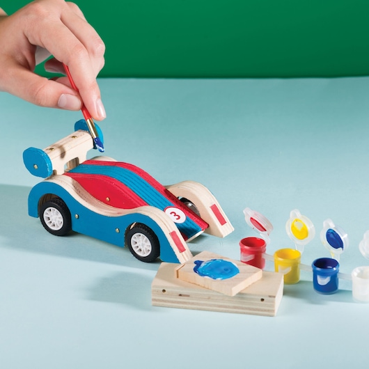 STANLEY JK030-SY pinewood car with blue and red paint, paint pots, hand painting details, front angle.