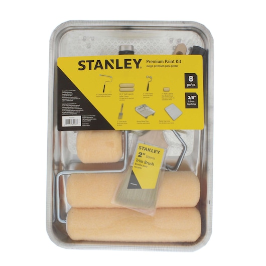 STANLEY PTST03508 premium paint kit with rollers, brush, tray, and liner, top view on white background.