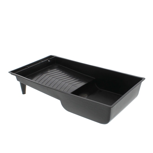 STANLEY PTST03939 black plastic paint tray with angled ridges, shown on white background, top side angle.