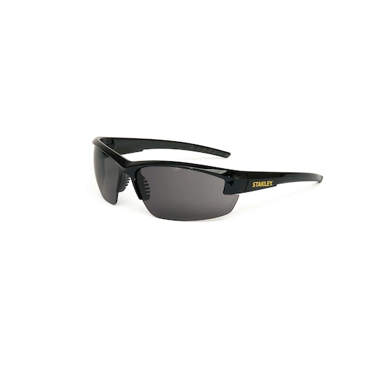Stanley black wraparound safety sunglasses, angled side view on white background