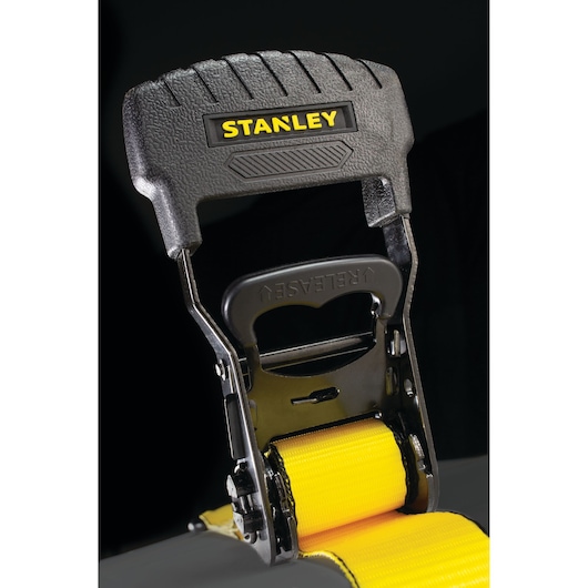 STANLEY S10074 yellow ratchet strap closeup with black handle and metal release lever.