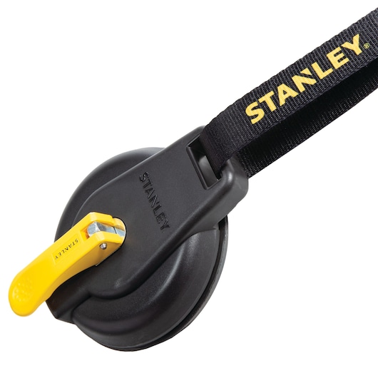 Stanley black suction cup lifter with yellow handle and black strap, white background, top view