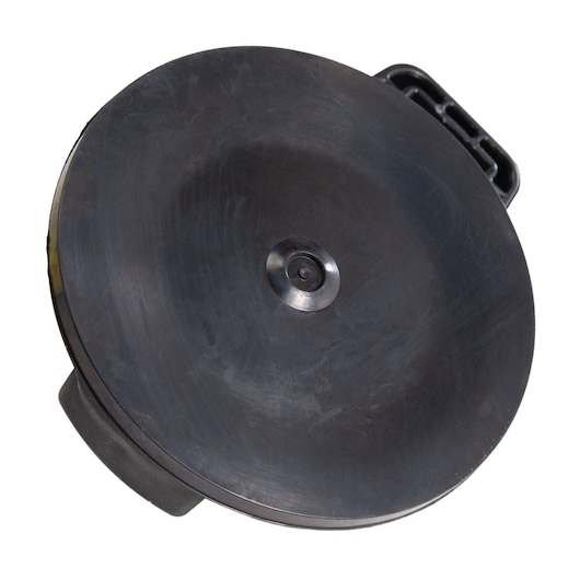 Stanley round black camera lens cap top view on white background, plastic construction with central grip.