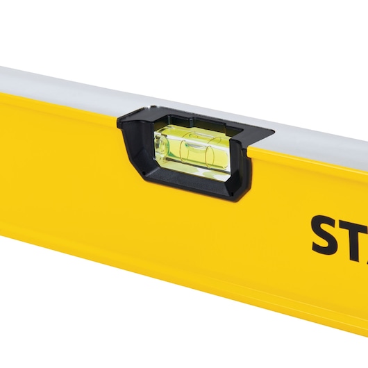 STANLEY STHT42504 yellow spirit level close-up with bubble vial, photography on white background.