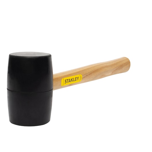 STANLEY STHT56144 rubber mallet with wood handle, product side angle on white background.