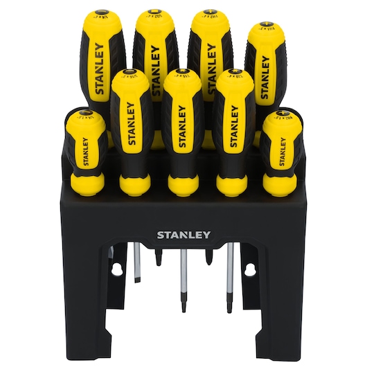 STANLEY STHT60835 screwdriver set with black and yellow ergonomic handles in a black stand, front view.