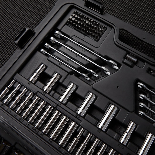 STANLEY STMT71654 socket set with wrenches and bits in black plastic case, close-up angle.