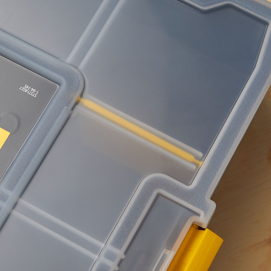 STANLEY STST14027 transparent plastic organizer lid with yellow latch, close-up angle.