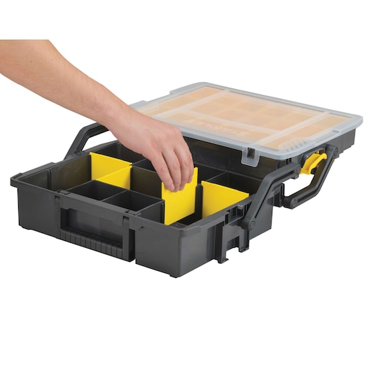 STANLEY STST14028 black and yellow organizer box with removable dividers, open with hand adjusting divider, front angle.