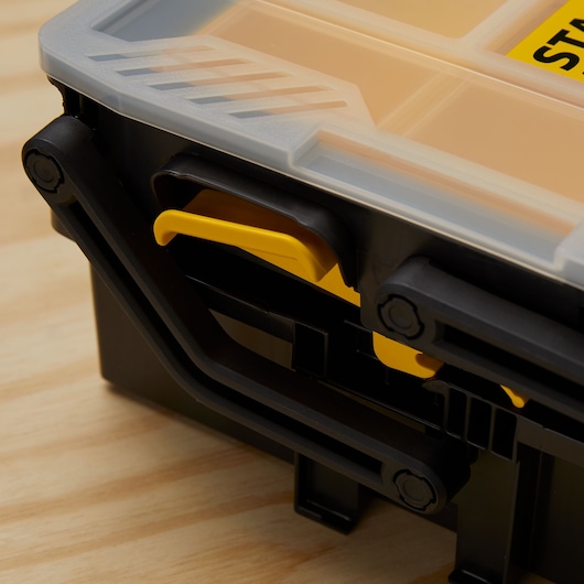 STANLEY STST14028 organizer close-up showing black and yellow latch on translucent lid.