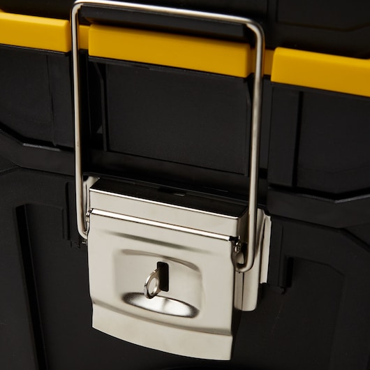 Stanley STST18613 black toolbox close-up showing metal latch and yellow accent, front view.