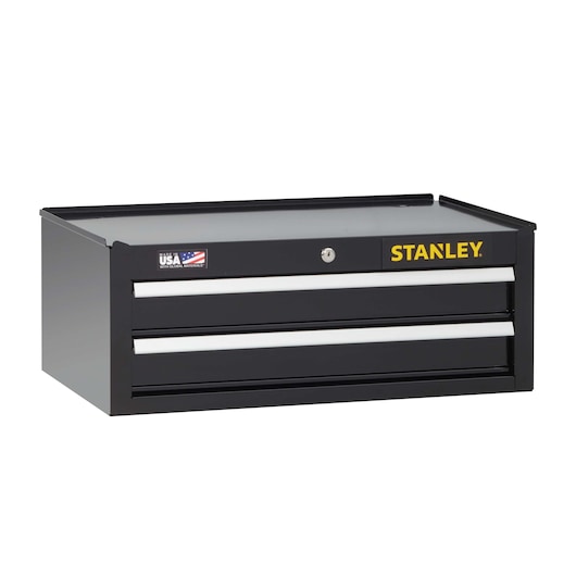 Stanley black metal tool chest with two drawers, side angle on white background, yellow logo on front.