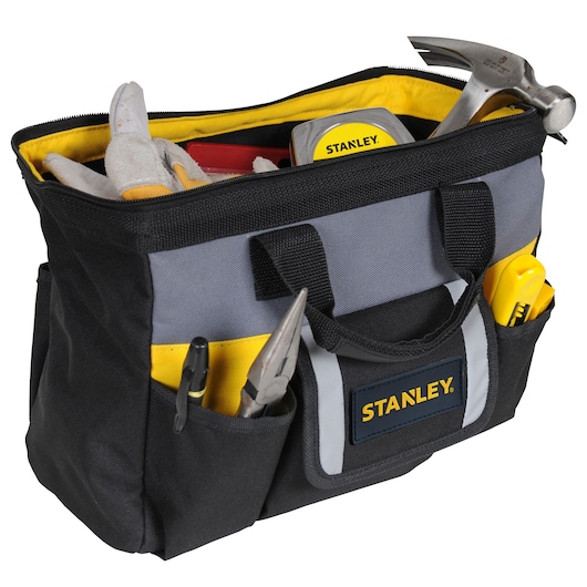 Stanley STST70574 tool bag with tools, black and gray, side angle photo.